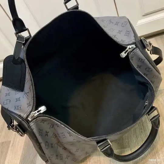 BANDOULIÈRE 50 LOUIS VUITTON KEEPALL 0704